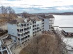DRONE VIEW TOWARDS CONDOS AND THE LAKE SIDE 